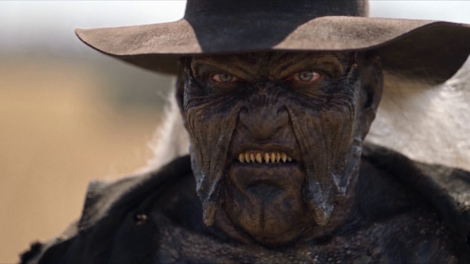 Creature in a wide-brimmed hat